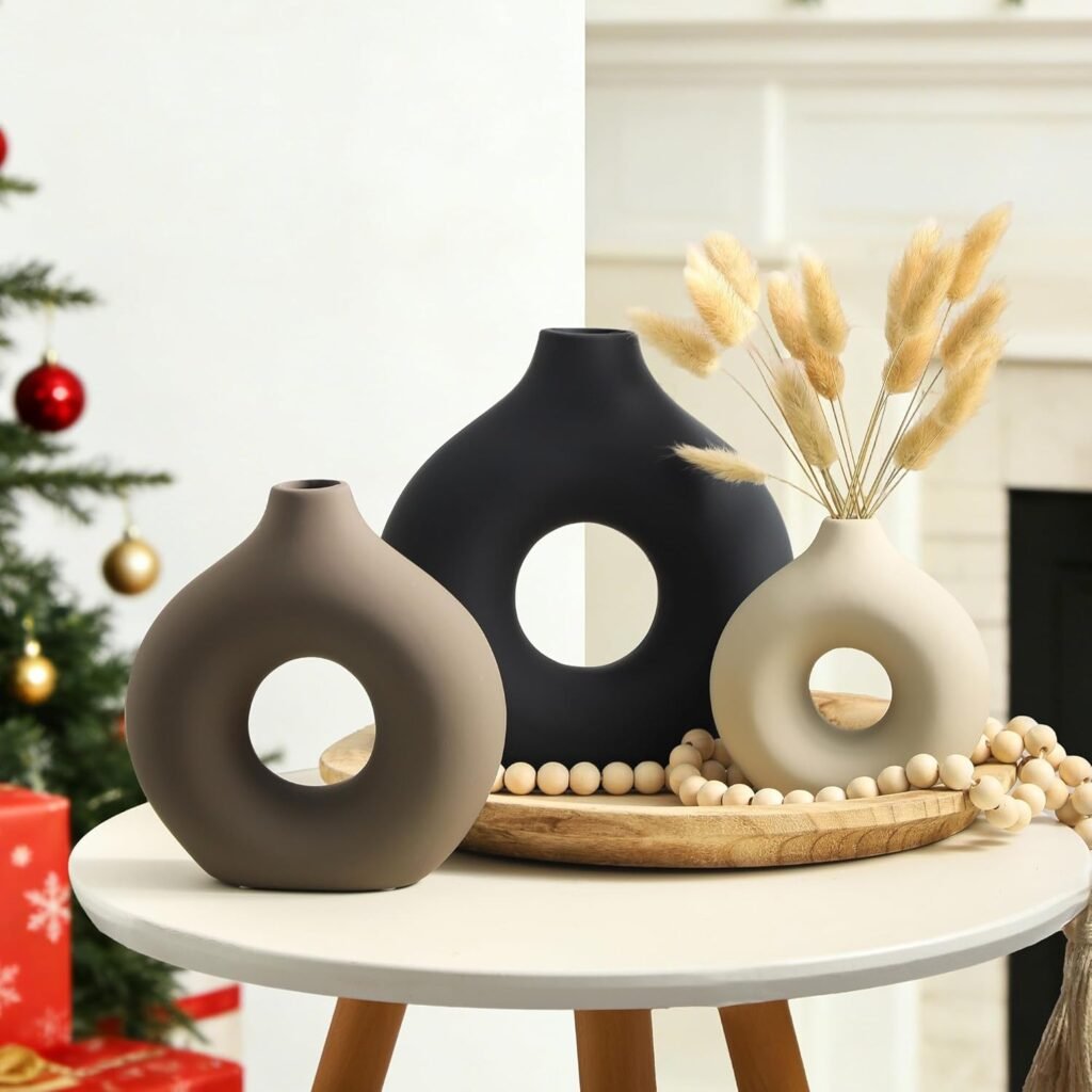 Handcrafted modern ceramic vase set with dried pampas grass in living room deco